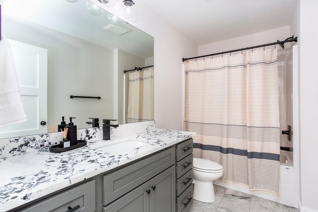 bathroom with shower / tub combo with curtain, toilet, and vanity