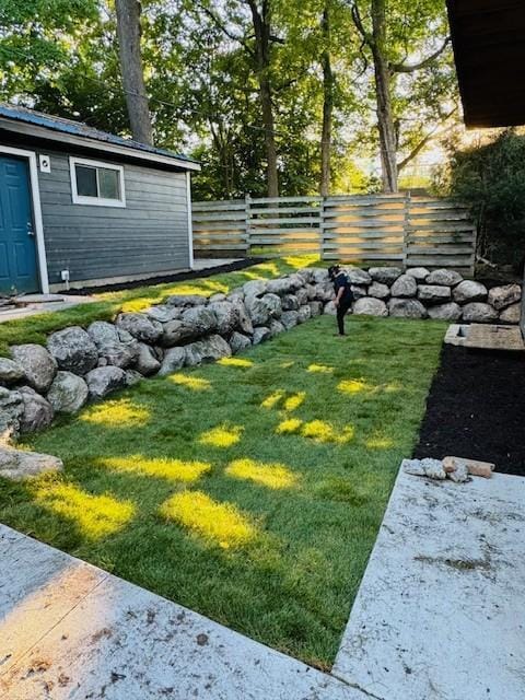 view of yard featuring fence