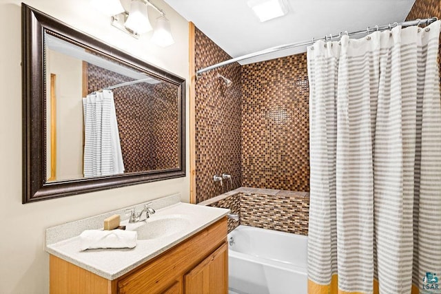 full bath with shower / bath combo with shower curtain and vanity