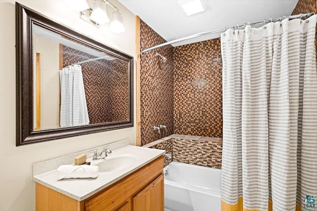 bathroom with shower / bathtub combination with curtain and vanity
