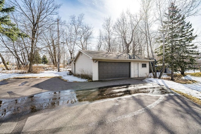 view of snow covered garage