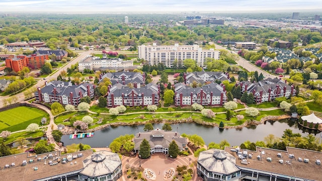 drone / aerial view with a view of city and a water view