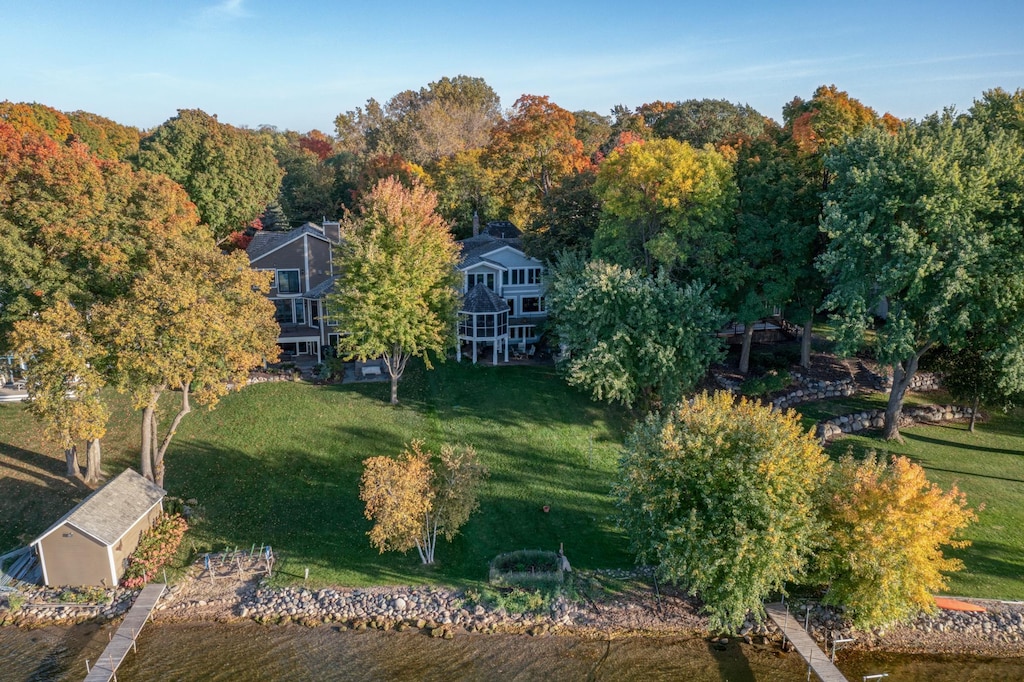 drone / aerial view featuring a water view