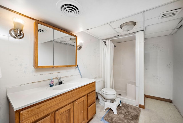 full bath with visible vents, toilet, a stall shower, and vanity