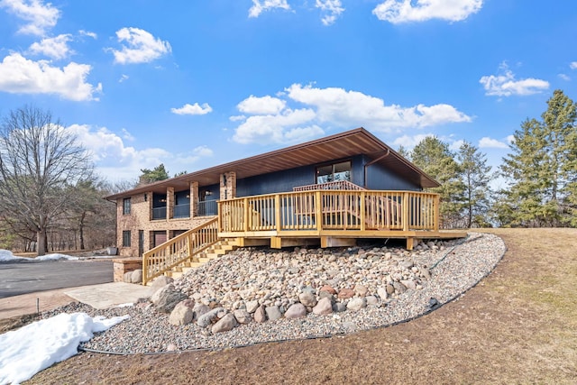 view of front of house featuring a deck