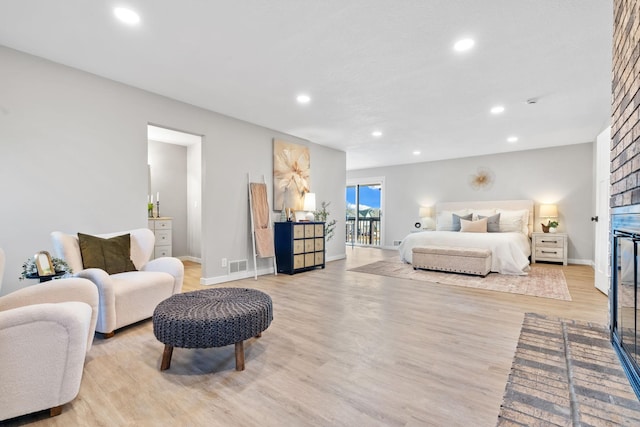 bedroom with visible vents, light wood-style flooring, recessed lighting, and baseboards