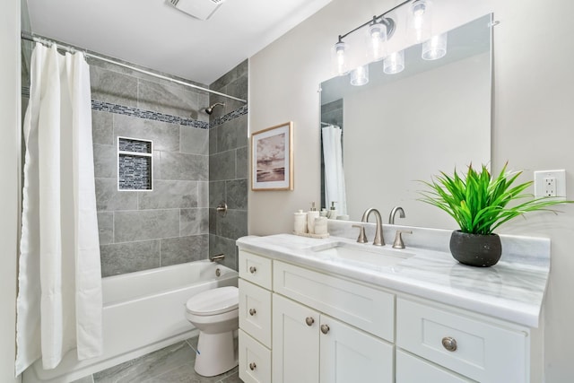 full bath featuring vanity, toilet, shower / bath combo, and visible vents