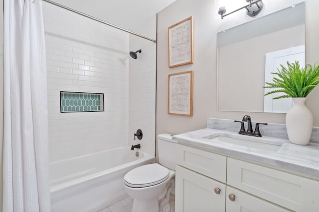 bathroom featuring shower / bath combo with shower curtain, toilet, and vanity