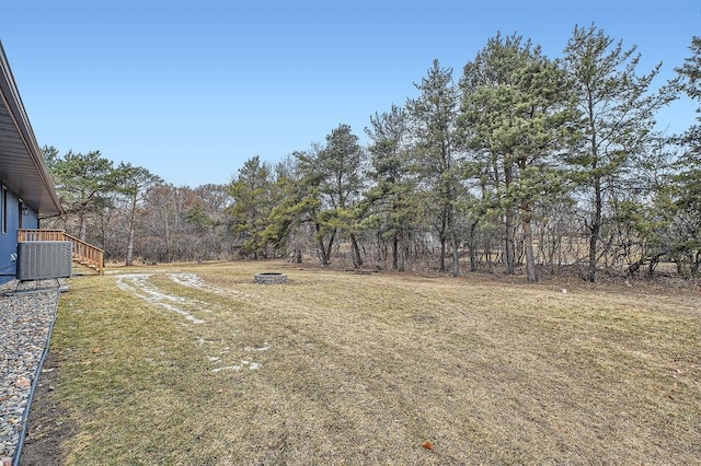 view of yard with central AC