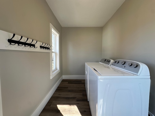 laundry area featuring laundry area, independent washer and dryer, baseboards, and dark wood-style flooring