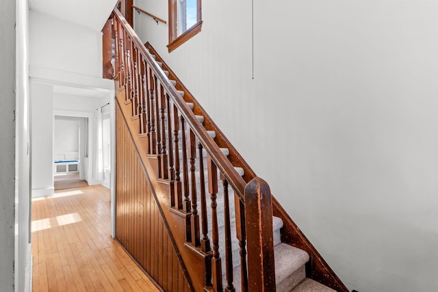 stairs with wood-type flooring