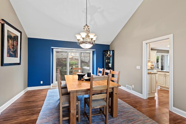 dining room with visible vents, baseboards, an inviting chandelier, and dark wood-style floors