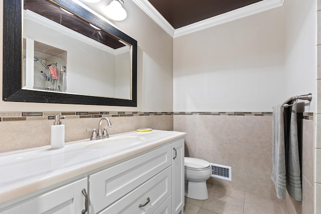 full bath featuring visible vents, toilet, ornamental molding, tile patterned floors, and vanity