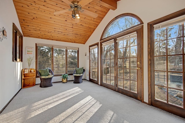 sunroom / solarium featuring wood ceiling, vaulted ceiling with beams, and ceiling fan