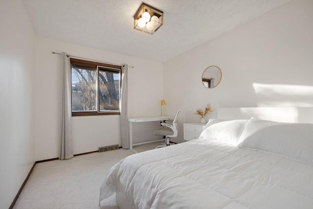 bedroom with baseboards, carpet floors, a textured ceiling, and vaulted ceiling