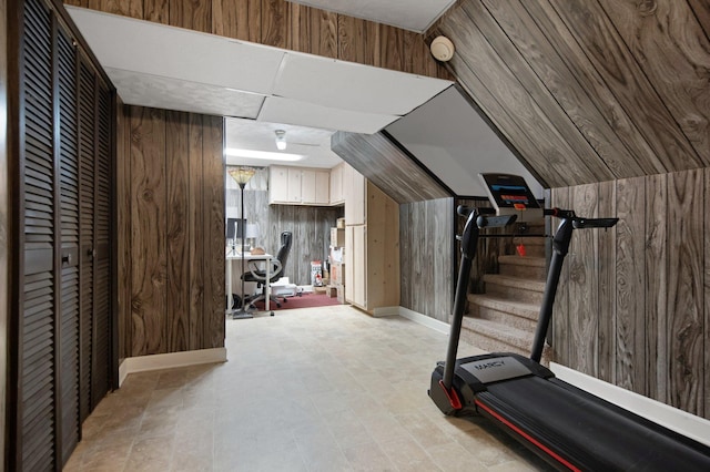 workout room with wooden walls