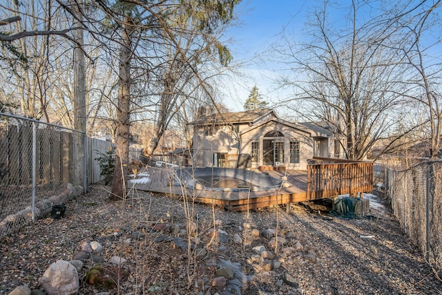 view of yard featuring a fenced backyard and a wooden deck