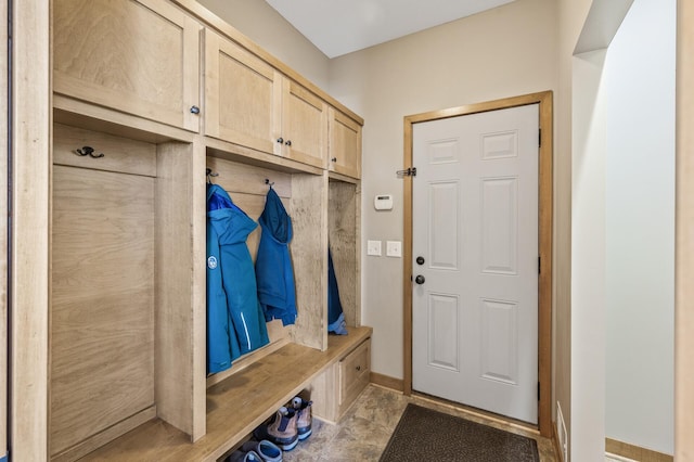 mudroom featuring baseboards