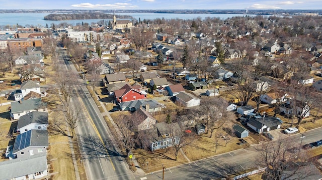 aerial view with a residential view and a water view