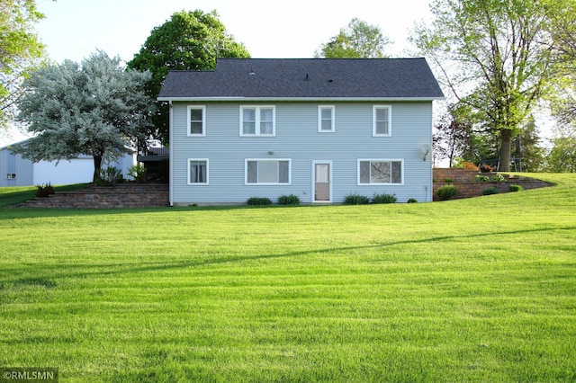 5501 70th St, Glencoe, MN 55336 - rear view of house featuring a lawn