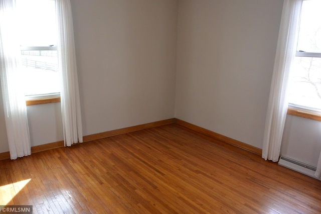 5501 70th St, Glencoe, MN 55336 - empty room featuring light wood finished floors and baseboards
