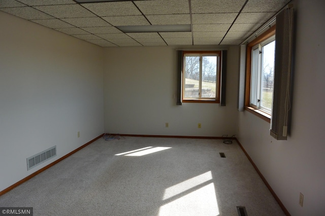 5501 70th St, Glencoe, MN 55336 - carpeted empty room with a drop ceiling and baseboards