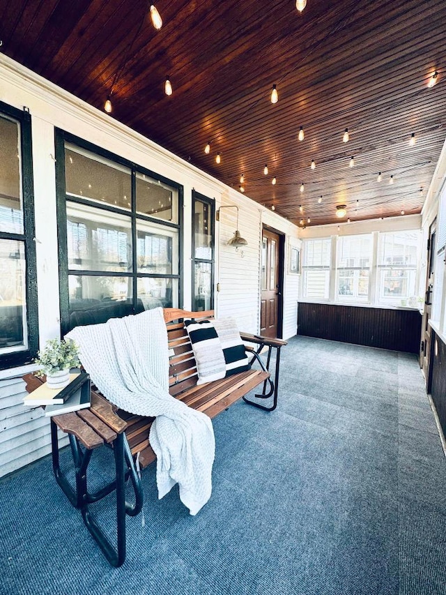 sunroom with wood ceiling