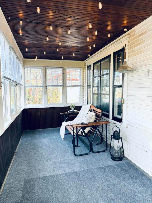 sunroom with wooden ceiling