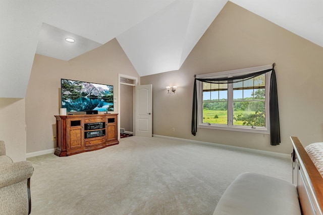 living area featuring light colored carpet, baseboards, and high vaulted ceiling