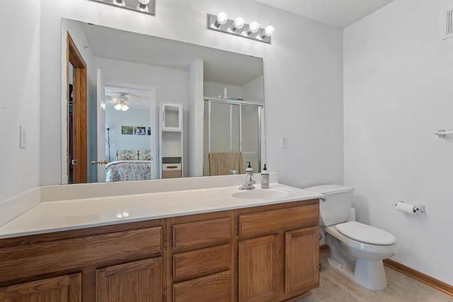 full bath featuring vanity, visible vents, ceiling fan, a shower stall, and toilet