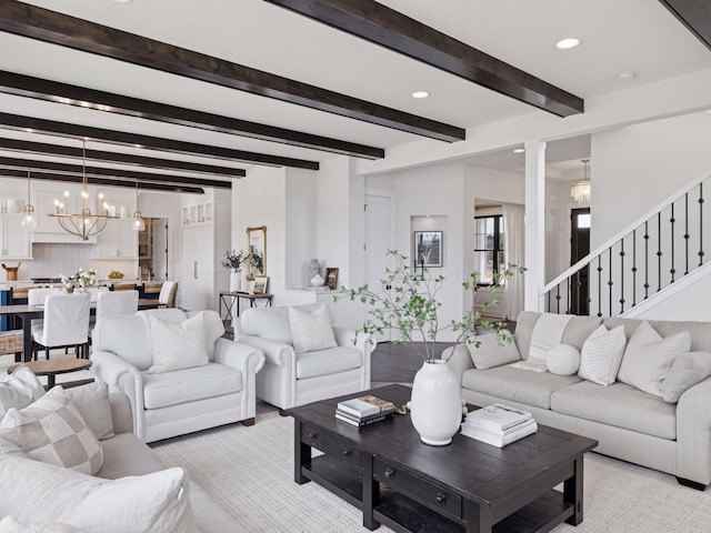 16419 Kiska St NE, Ham Lake, MN 55304 - living room featuring a chandelier, light colored carpet, recessed lighting, stairway, and beam ceiling