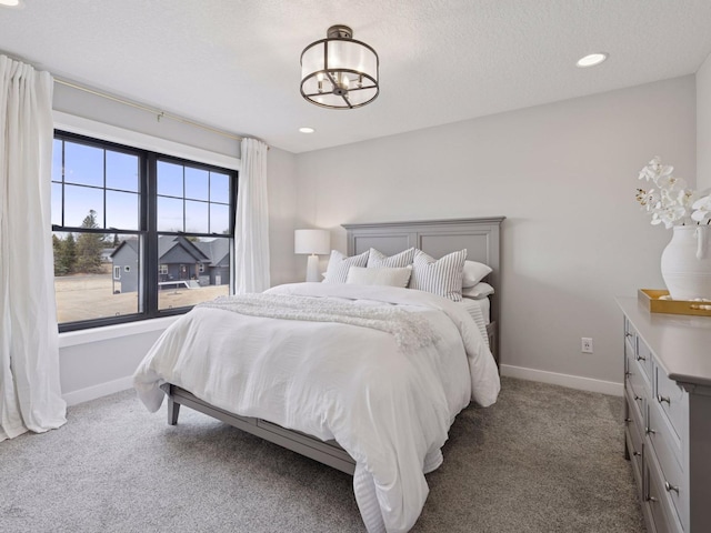 16419 Kiska St NE, Ham Lake, MN 55304 - bedroom with carpet flooring, recessed lighting, and a chandelier