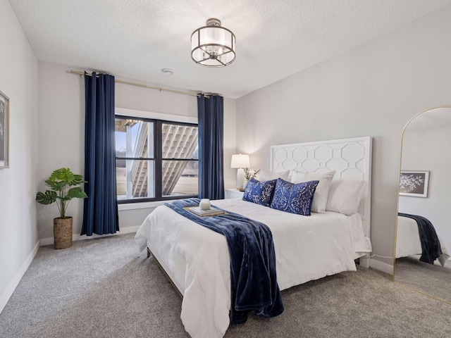 16419 Kiska St NE, Ham Lake, MN 55304 - carpeted bedroom featuring a textured ceiling and a chandelier