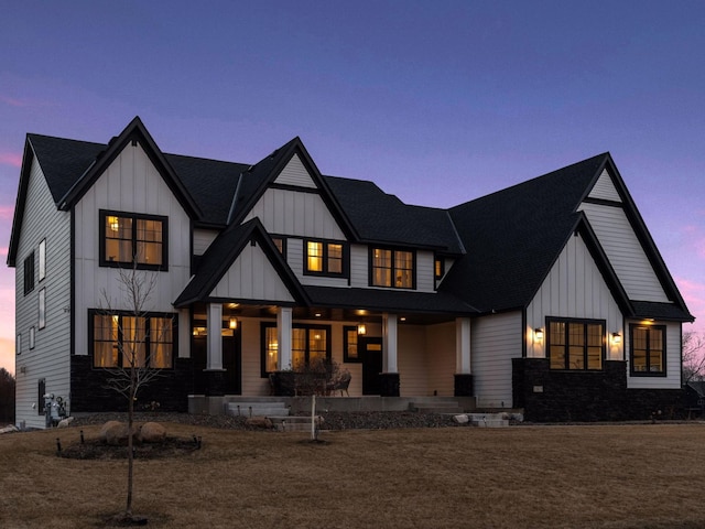 16419 Kiska St NE, Ham Lake, MN 55304 - modern inspired farmhouse with board and batten siding, a porch, and roof with shingles