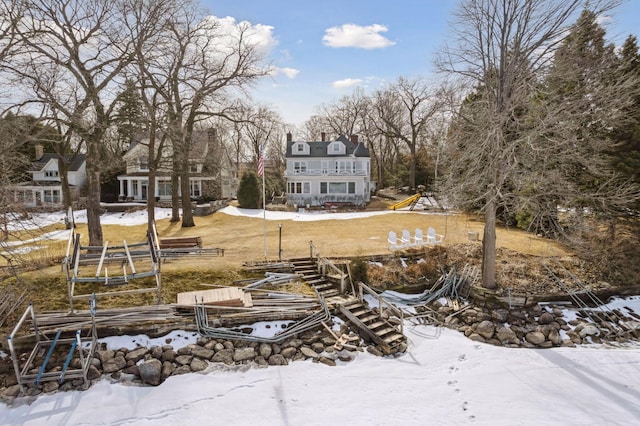 view of yard covered in snow