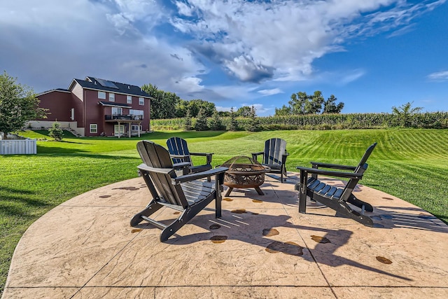 view of patio featuring an outdoor fire pit