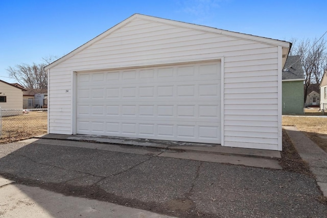 detached garage with fence