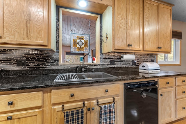 kitchen featuring light brown cabinetry, tasteful backsplash, black dishwasher, and a sink