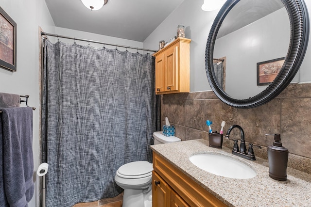 full bathroom with toilet, tile walls, vanity, and a shower with curtain