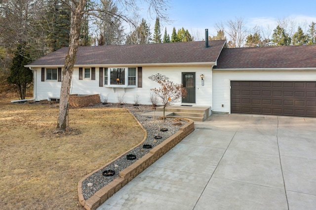 ranch-style house with driveway, a shingled roof, and a garage