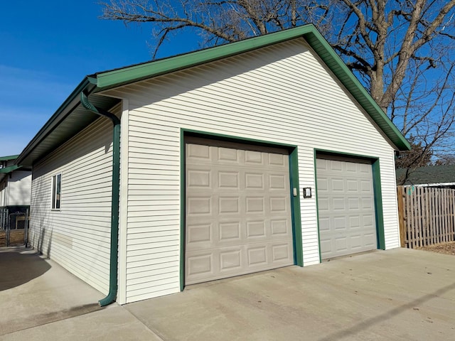 detached garage with fence