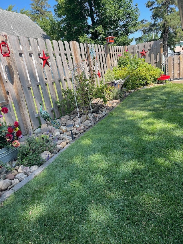 view of yard with fence