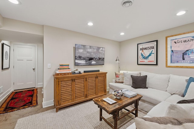 carpeted living area featuring recessed lighting, visible vents, and baseboards