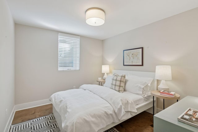 bedroom featuring baseboards