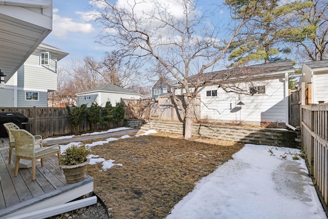 view of yard featuring a wooden deck and a fenced backyard