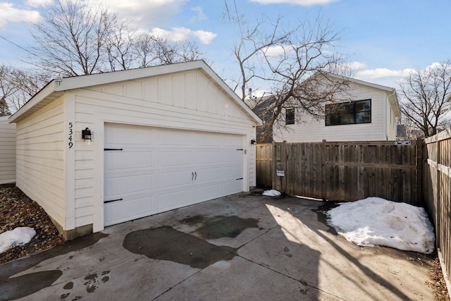 detached garage with fence