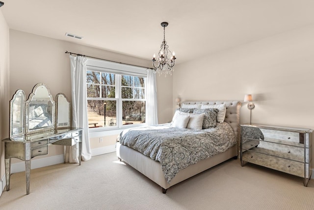 bedroom featuring carpet flooring, baseboards, visible vents, and a chandelier