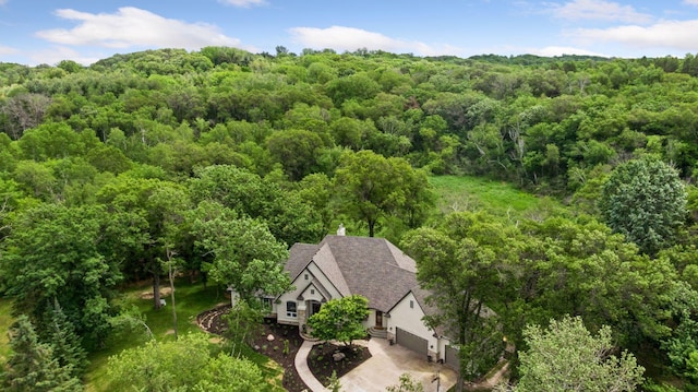 bird's eye view with a view of trees