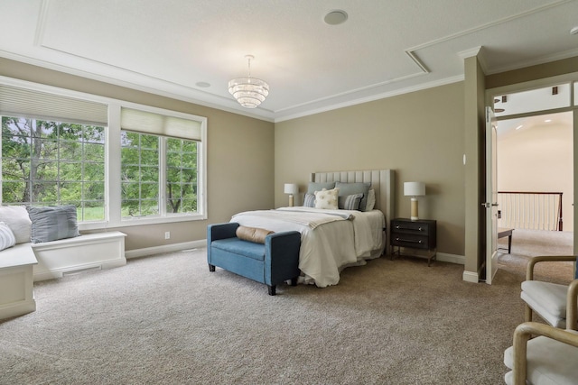 carpeted bedroom with baseboards and crown molding