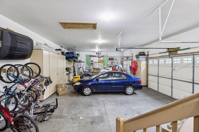 garage featuring a garage door opener